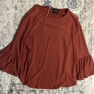 Dark orange/red shirt